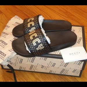 Black/gold gucci slides